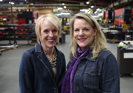 Co-owners Traci, left, and Lori Tapani, on the work floor of Wyoming Machine, have changed the way they hire by looking harder at potential, rather than only at skills.